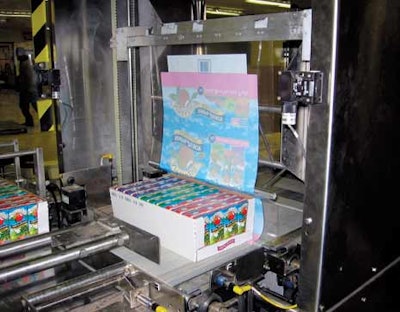 SHRINK WRAPPING. Film is applied in register by this single-curtain shrink wrapper/tunnel combination system, whose small footpr