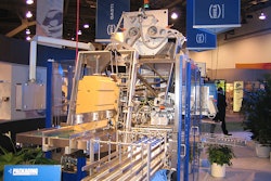 A massive Twinline robot from IWKA's A+F Automation at PACK EXPO. Carbon fiber construction and ELAU PacDrive automation help t