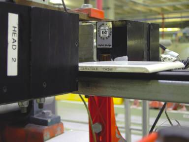 Thermal inkjet printers at Dal-Tile puts 1?8-inch codes on ceramic tiles moving past print heads at speeds of 220 tiles per minu