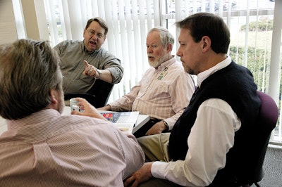 (Clockwise from left) Packaging World editor Pat Reynolds listens as P&G's Skip Holmes, Dave Chappell, and Rob Aleksa describe t