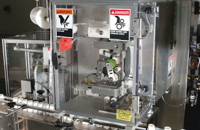 Packet system dispenses up to 300 desiccant packets per minute into bottles.