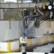 A new robotic carton loader places wrapped breakfast sandwiches into cartons on this line at Odom's Tennessee Quality Foods' pla