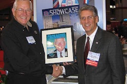 Joe Angel, publisher of Packaging World, congratulates Linc Jepson (left) on his retirement from NJM/CLI at Pack Expo Internatio