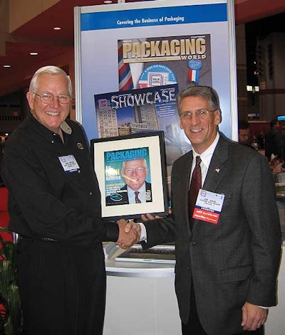 Joe Angel, publisher of Packaging World, congratulates Linc Jepson (left) on his retirement from NJM/CLI at Pack Expo Internatio