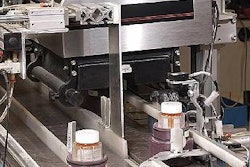 This induction sealer's coil design helps to control the direction of the electromagnetic energy that's given off during the ind