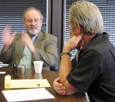 Deloitte's John Greaves, left, speaking recently to Packaging World's editor Patrick Reynolds.