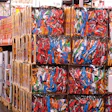 A bulk display from Frito-Lay gains attention in club stores. It uses printed, solid fiber trays and a glossy, high-clarity film