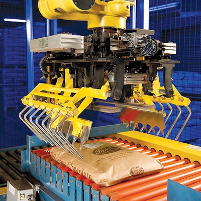 Mechanical clamp tool captures a multiwall bag for loading onto a pallet at Forbes Chocolate's Cleveland plant.