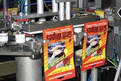 The Grill Wipes pads are pouched on a compact, four-station rotary machine that includes a customized filling station seen on t