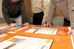 Examining press sheets at Exopack are (left to right): Charlie Ratterree of Fafard, Jeff Wagner of Exopack, and Eric Nurnberger