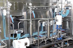 Because the pneumatic valve manifolds (circled) have an IP65 rating, they can be mounted right on the machine and don't require