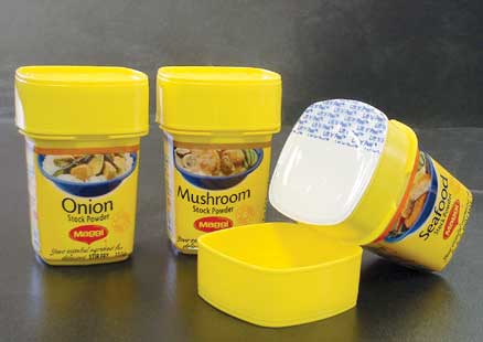 New containers for stock powder products are induction sealed to enhance shelf life.