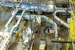 In this birds-eye view at Peak Foods, bowls are conveyed from parallel shrink banders at the bottom to the accumulation table at