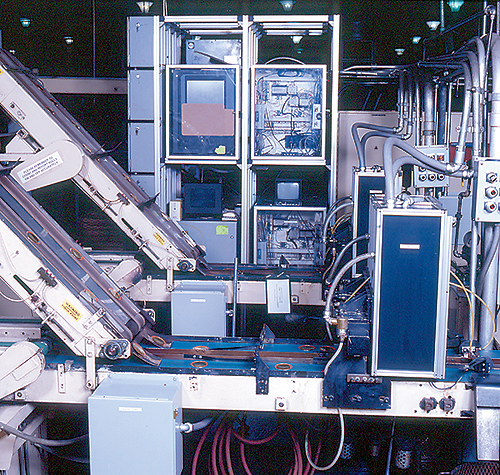 he camera vision sensor inspects lids as they are conveyed down the packaging line at Alltrista.