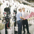At the Ft. Dearborn facility where the Oberweis label is produced, pressman Tom Peters (left) and flexible packaging customer se