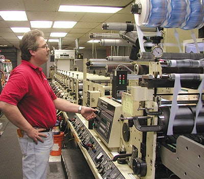 CPP press operator Alan Ross controls registration at a 20' press.