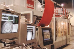 Shown here is a typical Pressco inspection system integrated with a Sidel blow molder.