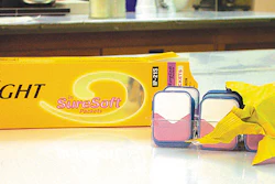 While most dental packets at Kodak are bundled in a polyester band and then flow-wrapped in a film/foil laminate (left), SureSof