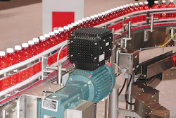 The washdown 'black box' drive, shown mounted atop a motor (inset below), can be positioned on or alongside the modular, preass
