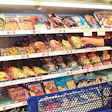 Private-label frozen fish fillets in stand-up pouches (right) were designed for Pathmark's newer upright freezer cases (above) w