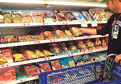 Private-label frozen fish fillets in stand-up pouches (right) were designed for Pathmark's newer upright freezer cases (above) w