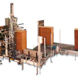 Automatic magazine loaders relieve workers of a strenuous job at one major household products manufacturer.