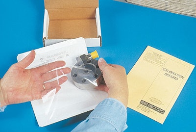 After folding two side flaps, an operator inserts the sensor product (above) between the package's corrugated and film material.
