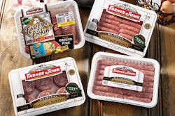 New packaging materials at Clougherty Packing include barrier plastic trays and barrier lidding material heat sealed to tray fla