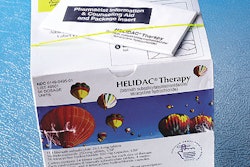 The carton containing Helidac therapy holds 14 individual blister cards (shown empty at top). Each blister has four daily dosage