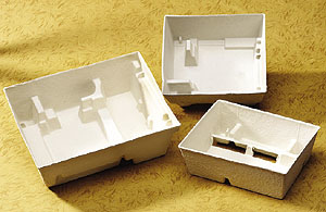 Three trays, with difficult forming details and die cuts, serve to hold all of Motorola's Personal Communications products1;aro