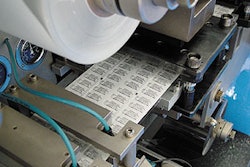 At this blister sealer, printed lid stock with a truncated bar code is applied and heat sealed to a blister containing medicatio