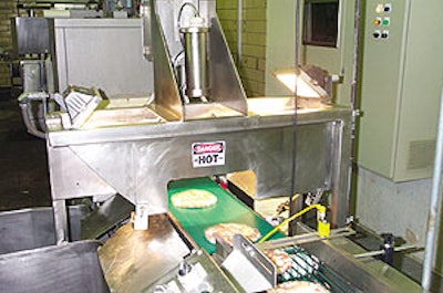 The first inspection checks the pizzas for any damage following shrink wrapping;