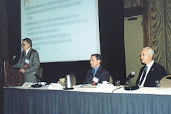 Dr. David Armstrong of FDA addresses the conference, while Dr. Peter Slade (center) and Dr. Chuck Sizer look on.