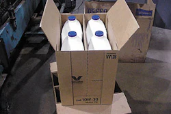With its center support and double-wall corners, the H-bliss-style box (above) was perfect for Valvoline's offset-neck bottle (b