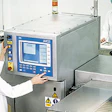 At Thorntons, the X-ray inspection system checks lidded boxes for contaminants and, through a software upgrade, chocolates that