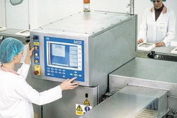At Thorntons, the X-ray inspection system checks lidded boxes for contaminants and, through a software upgrade, chocolates that