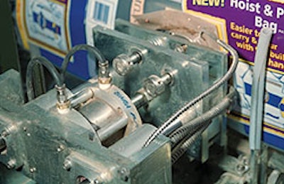 The bag's ergonomic handle (above) is produced on hf/f/s equipment (left) by a relocated and reoriented applicator (top).