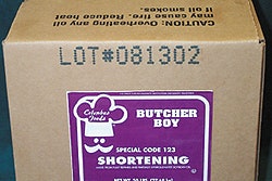 Alot number has been ink-jet printed to a case of shortening via a new printing unit that increases code legibility and programm