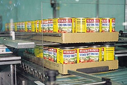 A new tray stacker is part of Furman's $3.5 million renovation made to three packaging lines. The system stacks five trays in tw