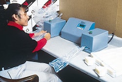 Shipped flat, the cushions are inflated using this manual bench-top system. IKON plans to install more automatic inflation devic