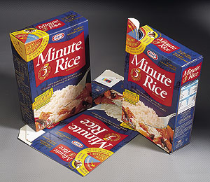 In two languages, the Kraft Canada Minute Rice box extols the new easy-open, easy-reclose feature that is an integral part of th