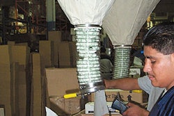 Aworker at Niles, IL-based e-commerce fulfillment firm Marketing Out-of-the-Box prepares a direct-to-consumer order for shipment