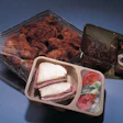 The Milwaukee County House of Correction produces meals in reusable trays like these in an unusual wrap and shrink process. The