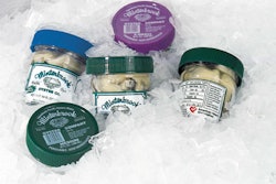 Since new labels and a large plastic cap were made part of the package, the container has much better impact on display. Inset s