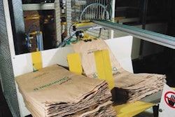 Open-mouth, pinch-bottom bags (top) are pulled from a magazine feed by vacuum cups. Sealed bags (above) exit the filler and are