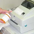 The thermal-transfer printer/encoder 'test' machine (above) operates at a Hines Veterans Hospital outpatient pharmacy. It encode