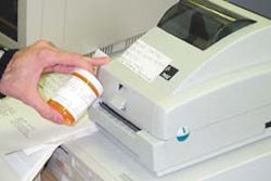 The thermal-transfer printer/encoder 'test' machine (above) operates at a Hines Veterans Hospital outpatient pharmacy. It encode