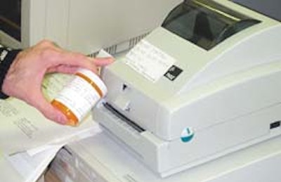 The thermal-transfer printer/encoder 'test' machine (above) operates at a Hines Veterans Hospital outpatient pharmacy. It encode