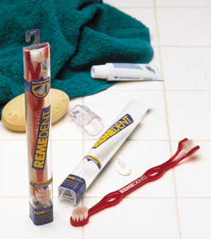 The new look for Remedent's tooth-and-gumbrush packaging includes a clear PETG tube, PS base and top, and colorful labels for in