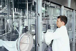 Glove ports allow operators to make adjustments at key machine areas.